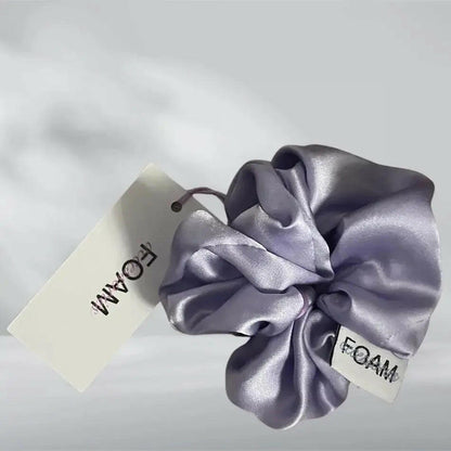 Silkessnodd- fläder.